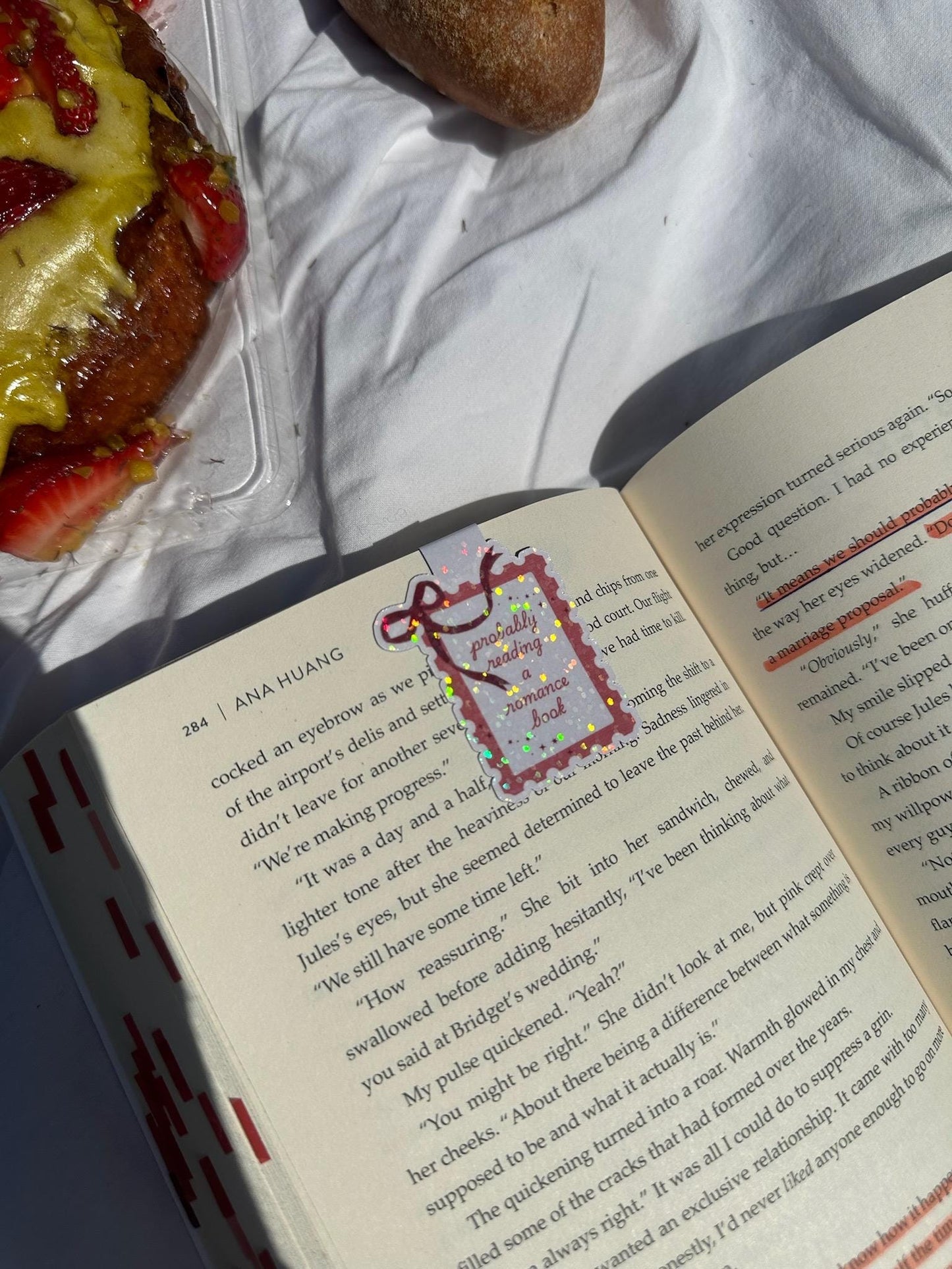 Probably reading a romance book - sparkling magnetic bookmark