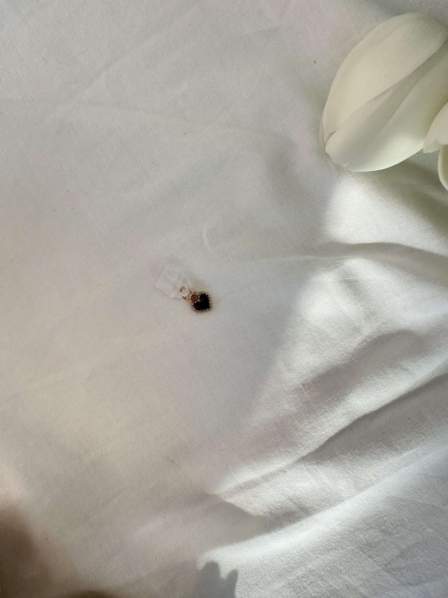 Tiny black heart Kindle plug