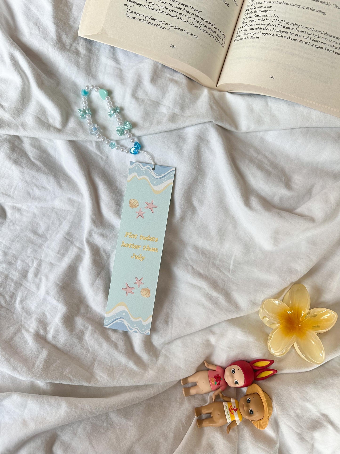 Books over beaches/plot twists hotter than July bookmark
